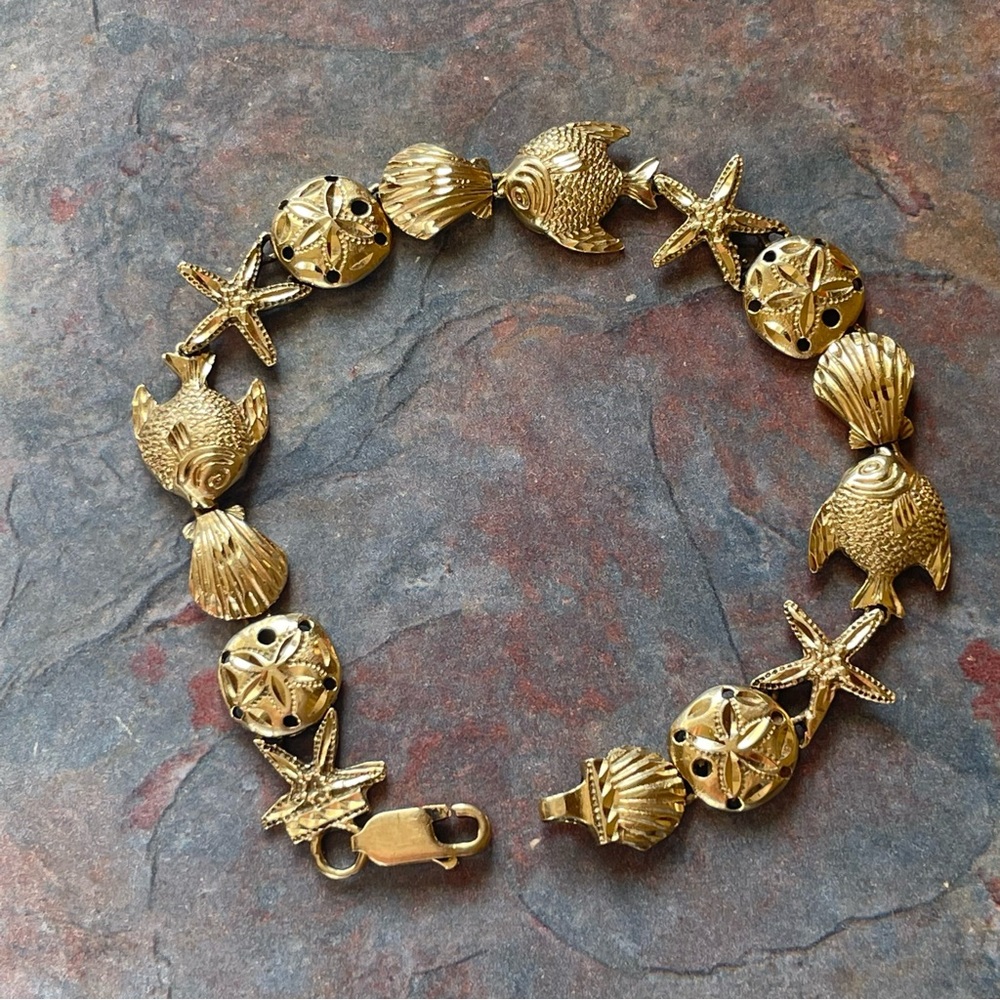 VINTAGE 14K YELLOW GOLD STARFISH, SHELL, AND SAND DOLLAR BRACELET 7” FINAL 🩷